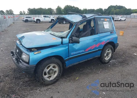 1994 Geo Tracker from USA, damaged, VIN 2CNBJ18U5R6945044